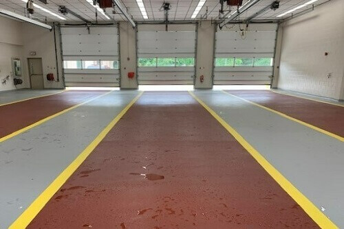 Red, grey and yellow striped flooring at firehouse